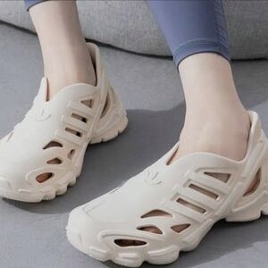 Adidas Cream Mules with Modern Cutout Design